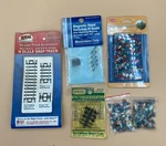 N-scale Accessories Lot New! Track, Reed Switches, Couplers, & 300 People. Fixed Price $16.50.
