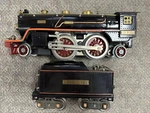 + Lionel Prewar Standard Tinplate Black W/ Orange 390E Steam Locomotive & Tender. Fixed Price $595.00.