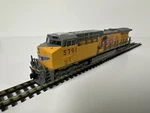 Kato Scale Ge AC4400CW Up # 5791 Building America With Flag 176-7008. Fixed Price $99.99.
