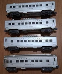 4 Lionel Silver Pass Cars. Fixed Price $100.00.