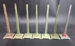 Pre-war Lionel Number 60 (X4), 69 (X1) & 62 (X2) Telegraph Poles Set Of 7. Fixed Price $59.99.