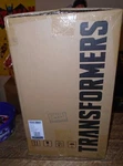 Robosen Transformers Auto-converting Optimus Prime Hasbro. Fixed Price $1249.99.