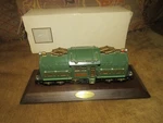 Vintage 1992 Avon Resin Model Of Lionel 381E Locomotive Display Board. Fixed Price $19.00.