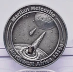 Martian Meteorite With Collectors Coin, North West Africa 13190 MT103. Fixed Price $107.39.